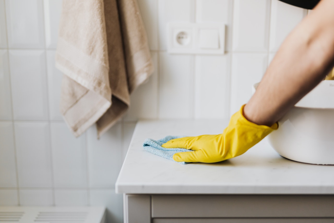 Sparkling clean white subway tile shower wall with fresh grout lines featured on BELK Tile Cleaning Blog
