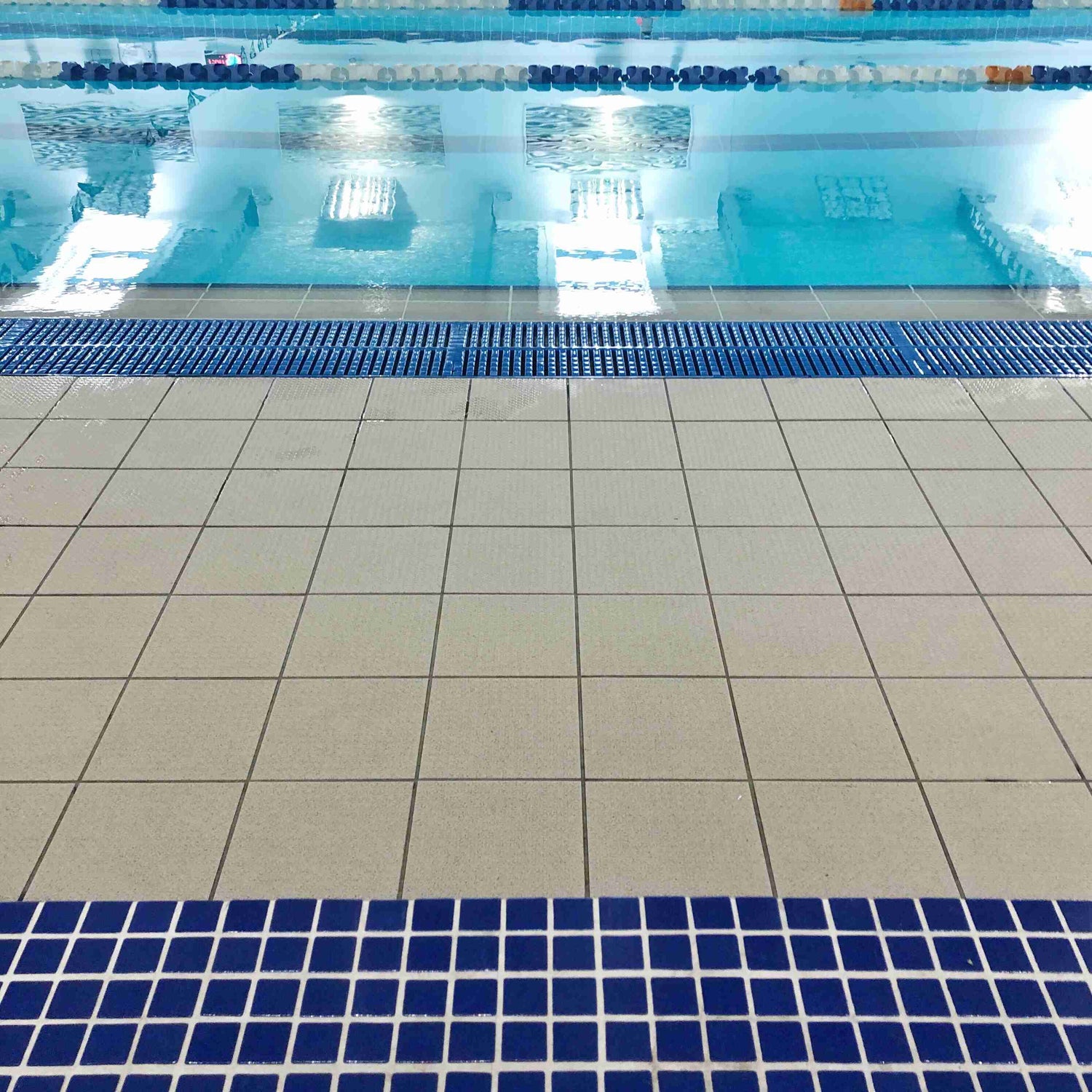 Revamp Your Pool: Modern Pool Waterline Tile Ideas by MIke Belk