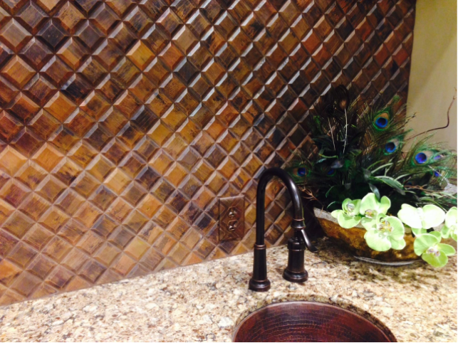 Herringbone pattern kitchen backsplash tile installation featured on BELK Tile Backsplash Blog