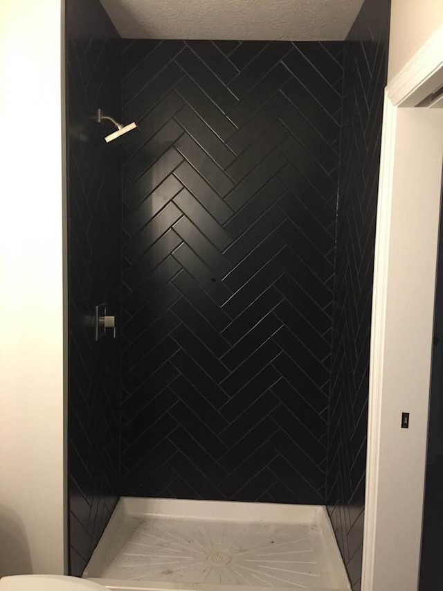 Herringbone tile shower belktile.com